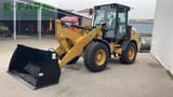 2023 Caterpillar 908 wheel loader, front three-quarter view