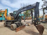2016 Volvo LG670BM wheel excavator, side profile view