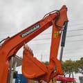 2023 Doosan DX55-9C mini excavator boom and bucket detail