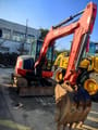 2021 Kubota KX155-5 mini excavator, front three-quarter view