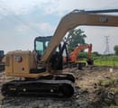 2019 Caterpillar 307E crawler excavator, rear three-quarter view