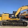 2023 Caterpillar 323DL excavator, side view
