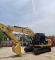 Caterpillar 320GC crawler excavator, side profile view
