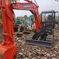 2022 Doosan DH55 mini excavator, front three-quarter view