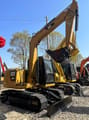 2025 Caterpillar 308E mini excavator, side profile view