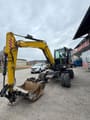 2020 Doosan DX57W-5 wheel excavator, front three-quarter view