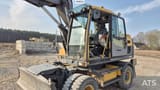 2014 Volvo EW160D wheel excavator cab and front view