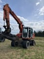 1995 Atlas 1304K excavator, front three-quarter view
