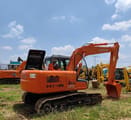 Hitachi Zaxis 120 crawler excavator, rear three-quarter view