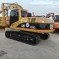 2019 Caterpillar 320CL excavator, rear three-quarter view
