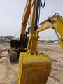 Komatsu excavator, close-up view of bucket and arm