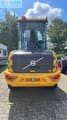 2023 Volvo L30 Mini Excavator from the rear, highlighting the Volvo emblem and rear lights.