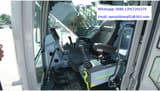 2026 Zoomlion ZE215G Crawler Excavator with a detailed view of the operator's seat and controls.