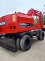 Doosan DH150W-7 wheel excavator, rear three-quarter view