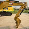 2021 Caterpillar 303.5E mini excavator boom and bucket detail