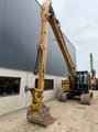 2019 Caterpillar 313FL long-reach crawler excavator, front three-quarter view
