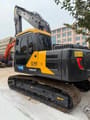 2025 Volvo EC140 crawler excavator, rear three-quarter view