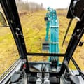 2024 Sunward SWE25UF Mini Excavator interior view from the operator's seat, showing controls and pedals.