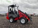 2011 Weidemann 1160 CC30 mini excavator, side view