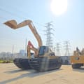 2021 Caterpillar 320C amphibious excavator, side view