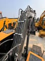 Hyundai R220LC-9S crawler excavator boom and hydraulic lines