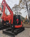 Kubota KX165 mini excavator, front three-quarter view