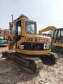 2010 Caterpillar 308C mini excavator, rear three-quarter view