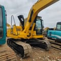 2023 Komatsu PC120-8 crawler excavator, rear three-quarter view