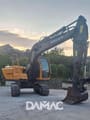 2000 Volvo EC140BLC crawler excavator, side profile view
