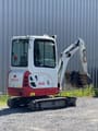 2020 Takeuchi TB216 mini excavator, rear three-quarter view