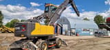 2018 Volvo EW240EMH material handler, rear three-quarter view