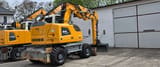 2017 Liebherr A914 COMPACT wheel excavator rear three-quarter view