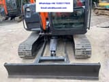 2024 Hitachi ZX60 excavator front view with blade