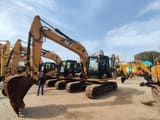 2011 Caterpillar 313D crawler excavator, side view