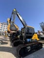 2023 Volvo EC140 crawler excavator, side view