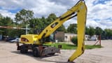 2011 Caterpillar M318D MH material handler, side view