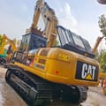 2024 Caterpillar 329D L crawler excavator, rear three-quarter view