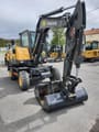 2021 Volvo EW60E wheel excavator, front three-quarter view