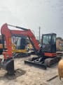 2025 Hitachi ZX55 mini excavator, side profile view