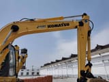 2015 Komatsu PW150-6 excavator boom and cab view