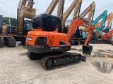 2022 Doosan DX60-9C crawler excavator rear three-quarter view