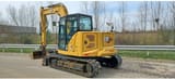 2023 Caterpillar 308 crawler excavator, rear three-quarter view