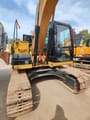 2011 Caterpillar 313D crawler excavator, front-side view