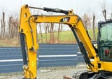 2019 Caterpillar 305.5E mini excavator boom and cab view
