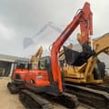 2018 Doosan DX60 crawler excavator, side view