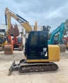 Caterpillar 305.5E mini excavator, side view