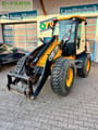 2011 JCB 409 wheel loader, front three-quarter view