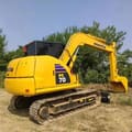 Komatsu PC70 crawler excavator, rear three-quarter view
