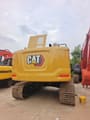2025 Caterpillar 323 crawler excavator rear view