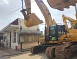 2016 Caterpillar 329D crawler excavator, front three-quarter view